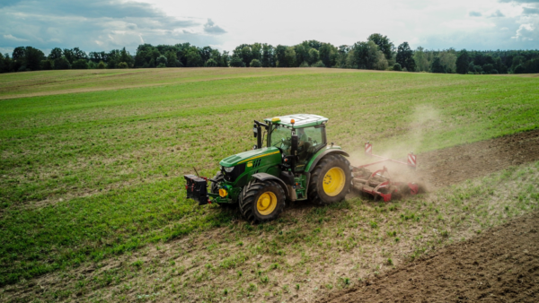 Tractor plowing field