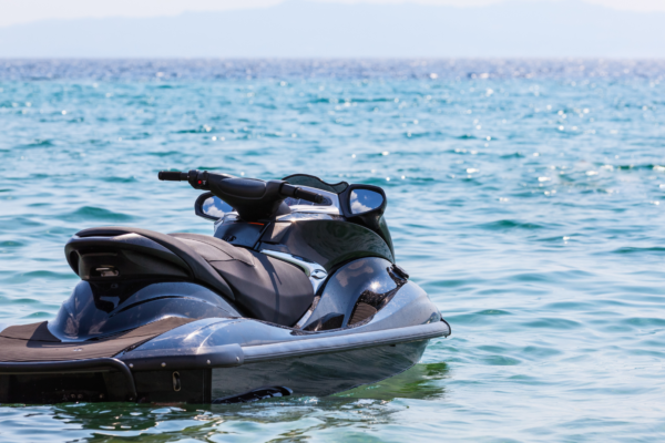 Jetski floating in ocean.